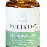Nahaufnahme von Puristic Immunbooster im braunen Glas zur Stärkung des Immunsystems
