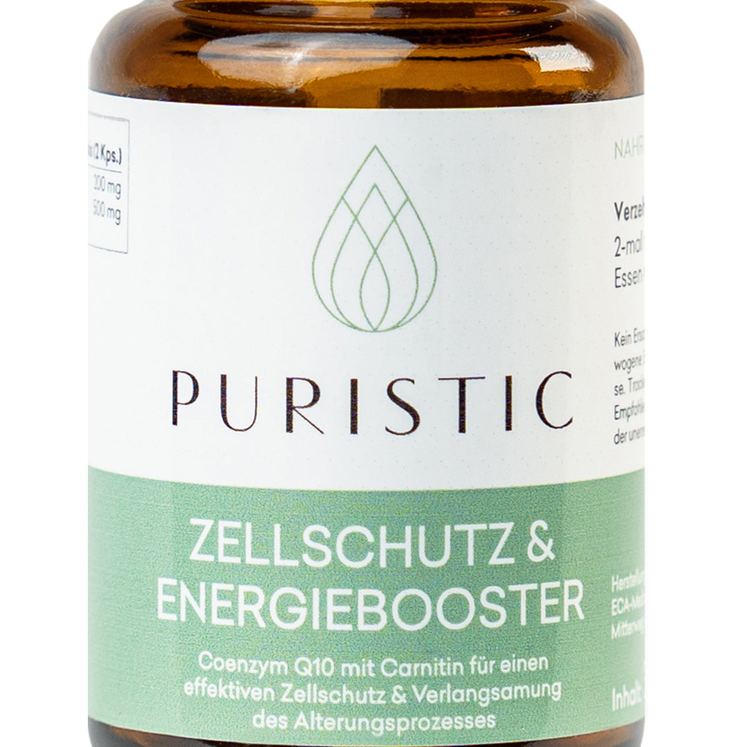 Nahaufnahme von Puristic Zellschutz & Energiebooster Supplements in braunem Schraubglas
